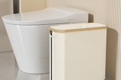 a toilet paper storage bin