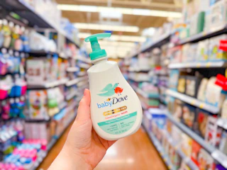 hand holding dove baby wash