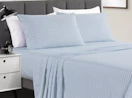 a sheet set on a bed