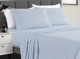 a sheet set on a bed
