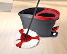 a mop with a tank bucket on hardwood floors