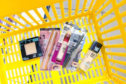 maybelline cosmetics in yellow shopping basket