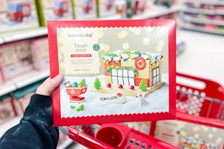 Target Store Favorite Day Holiday Kit held over Target shopping cart