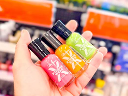 hand holding sally hansen extreme wear polish in cvs