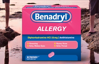 a pink and blue box of allergy medicine 