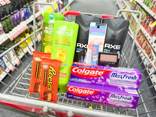 toothpaste, reeses, shampoo, body wash, and makeup in a cart