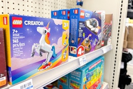 lego sets on a shelf at cvs