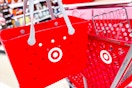 hand holding bullseye bogg bag next to target cart