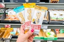 hand holding perfect bars at aldi