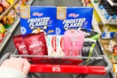 frosted flakes, cough drops, toothpaste, and razors in a cart