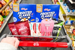 frosted flakes, cough drops, toothpaste, and razors in a cart