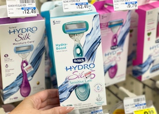 hand holding schick hydro silk 5 razor