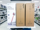 dyson v8 origin cordless vacuum on a target shelf