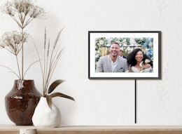 a digital frame on a wall 