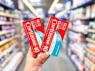 Two Cortizone-10 Gels held up in center isle at Walmart