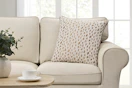 Lifestyle image of a 20x20 leopard decorative pillow
