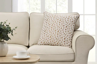 Lifestyle image of a 20x20 leopard decorative pillow