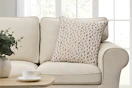 Lifestyle image of a 20x20 leopard decorative pillow
