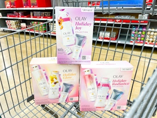 Olay Holiday beauty boxes in a Walmart cart