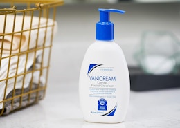 a bottle of facial cleanser on a counter 