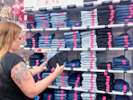 shelves on jeans in store