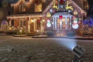 a christmas projector on a home