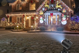 a christmas projector on a home