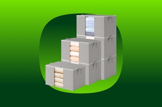 A set of six 90-pound storage bags most suitable for clothes or bedding. They are stacked in a stepped formation.