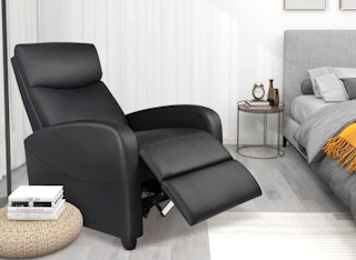 a massage recliner chair in a room