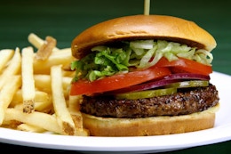 A close up on a Beef 'O' Brady's hamburger and fries