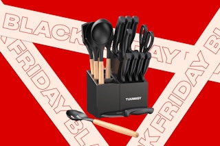 a kitchen knife set on a red background