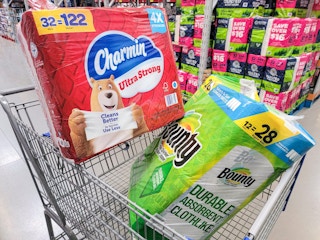 pack of charmin bath tissue & bounty paper towels in a cart
