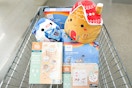 assorted toys in an aldi shopping cart