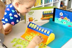 child playing with letter game