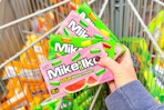 hand holding mike and ike candy