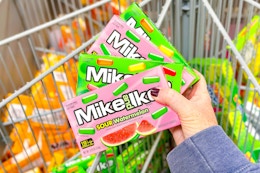 hand holding mike and ike candy