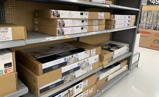 area shot of flat pack desks in walmart store