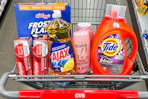 colgate toothpaste, frosted flakes cereal, ajax dish soap, loreal elvive shampoo, and tide detergent in a cart