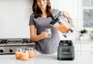 woman pouring smoothie out of a Ninja classic blender