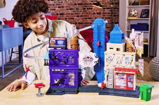 Lifestyle image of the Marvel Spider-Man VenomVersus Playset being played with by a child