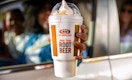 Person holding a root beer