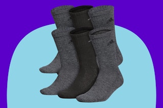 adidas mens Athletic Cushioned Crew Socks on a blue background.