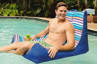 lifestyle image of a man on a pool float