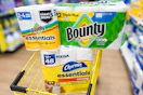 bounty paper towels and charmin toilet paper in yellow shopping cart