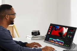 a man using a portable monitor