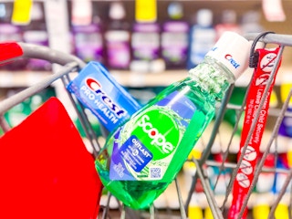 crest toothpaste and scope mouthwash in a cart
