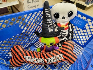 large halloween dog toys in a cart