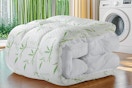 bamboo mattress pad folded up on floor