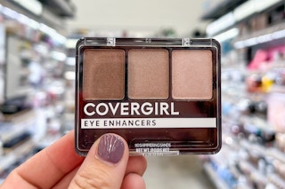 hand holding one Covergirl eye enhancers kit