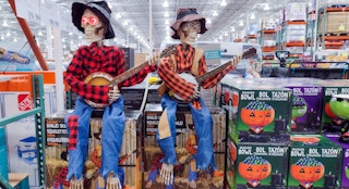 banjo playing skeletons sitting on boxes at costco